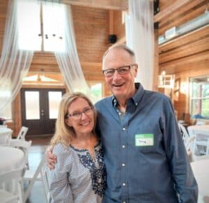 Doug Pritchard and his wife Cynthia posing for a picture